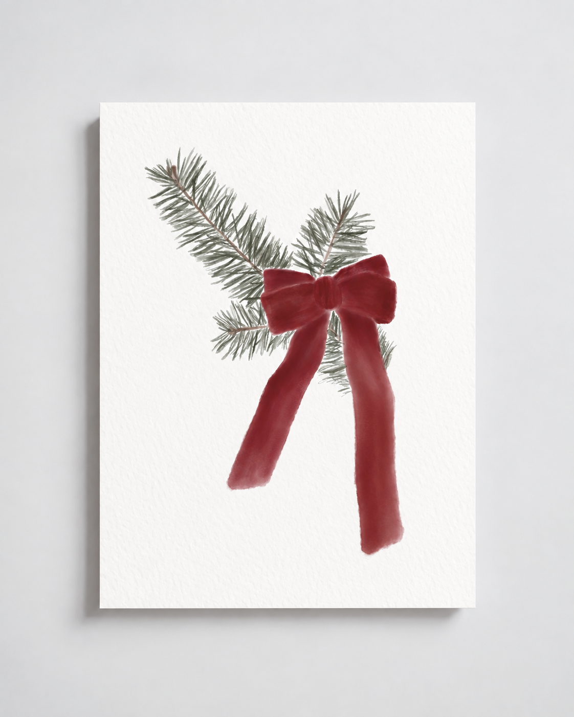 Evergreen & Ribbon | Christmas Bow Art Print displayed as a paper art print