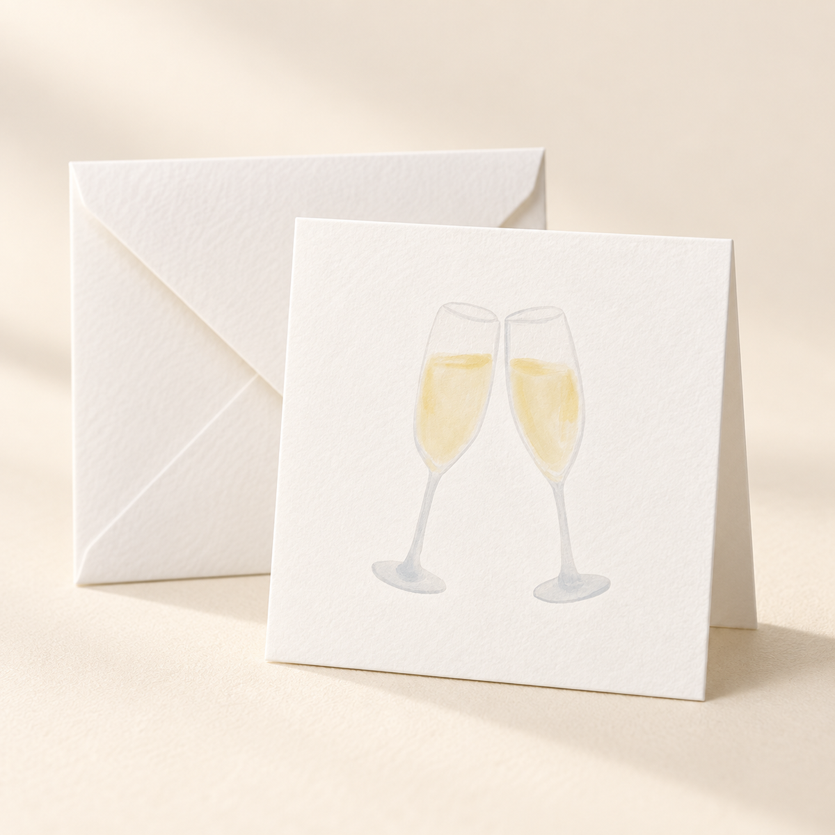 Mockup of Champagne Glasses 2 x 2 inch folded mini notecard with envelope