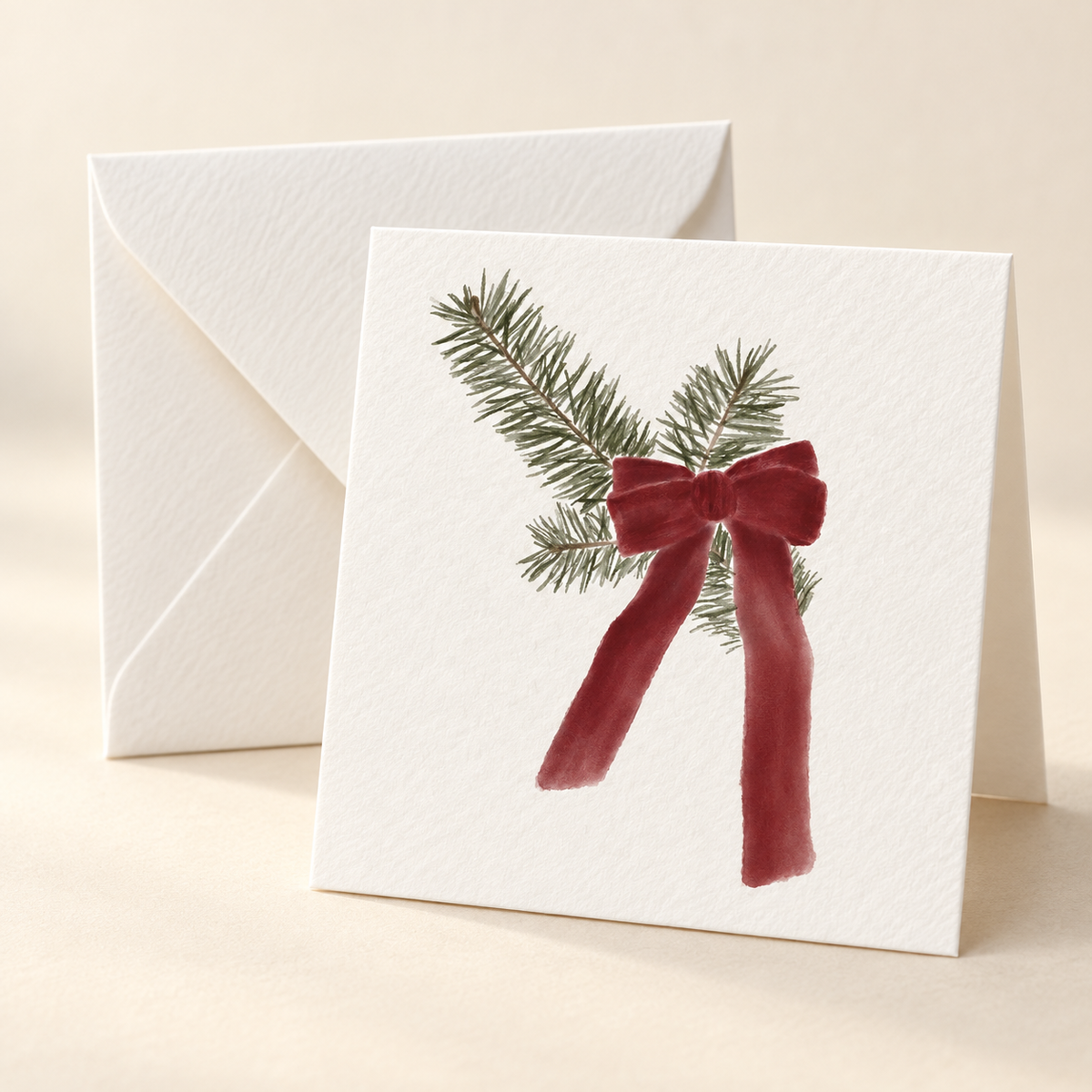 Mockup of Holiday Bow 2 x 2 inch folded mini notecard with envelope